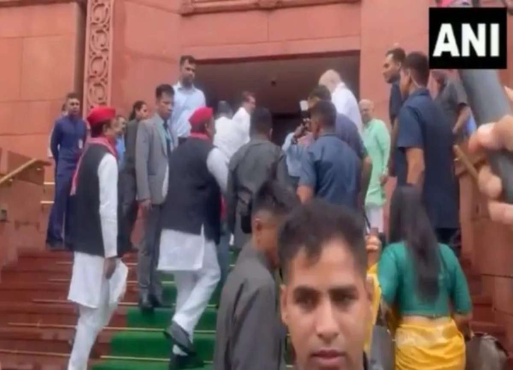 In warm gesture, Akhilesh Yadav shakes hands with Amit Shah outside Parliament | Watch Video
